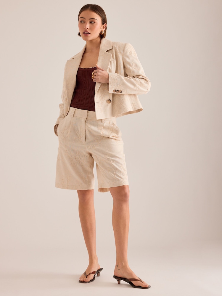 Anthropologie Cream Maeve Embroidered Tailored Shorts - Image 1 of 1