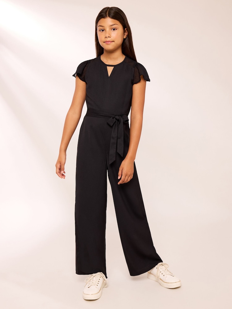 Lipsy Black Cut Out Mesh Detail Jumpsuit (7-16yrs) - Image 1 of 5 Lipsy Black Cut Out Mesh Detail Jumpsuit (7-16yrs) - Image 1 of 5