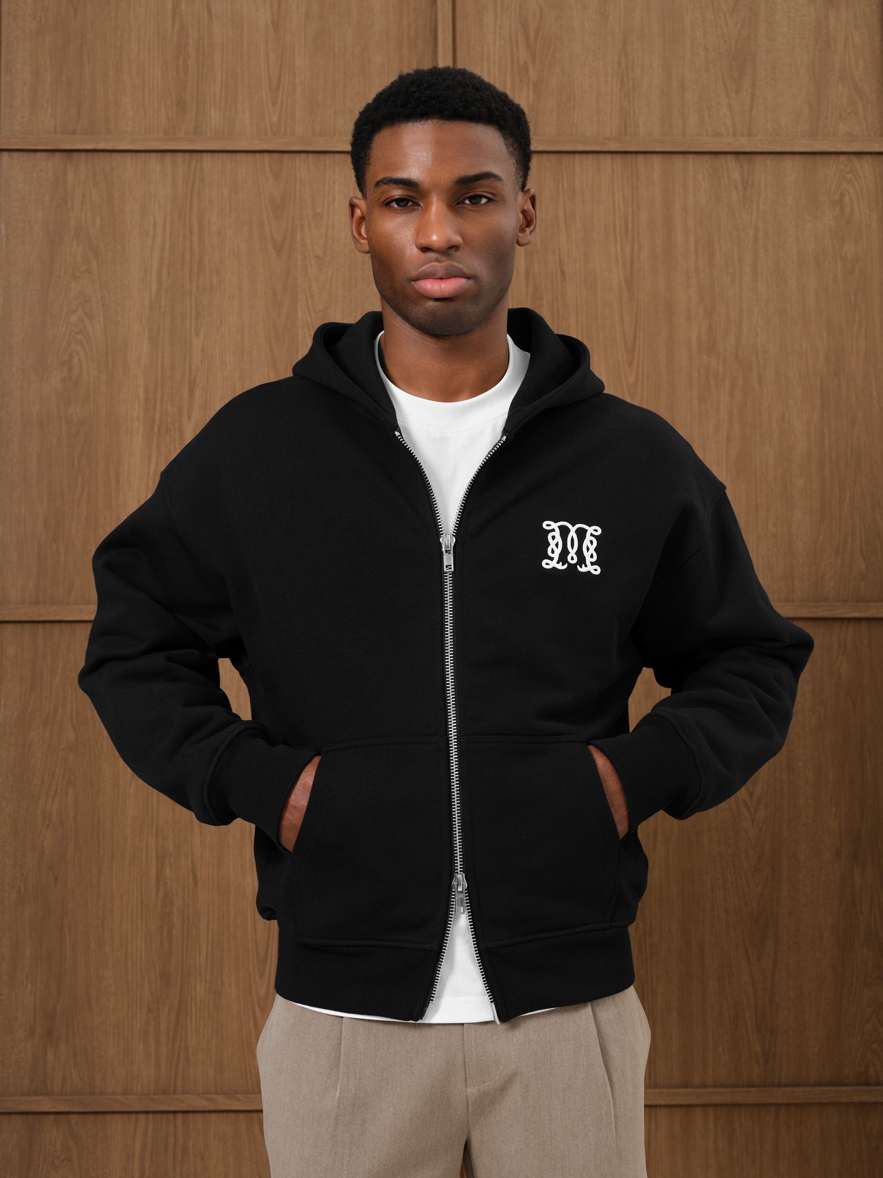 Buy MAUVAIS Black Embroidered Monogram Zip Through Hoodie from the