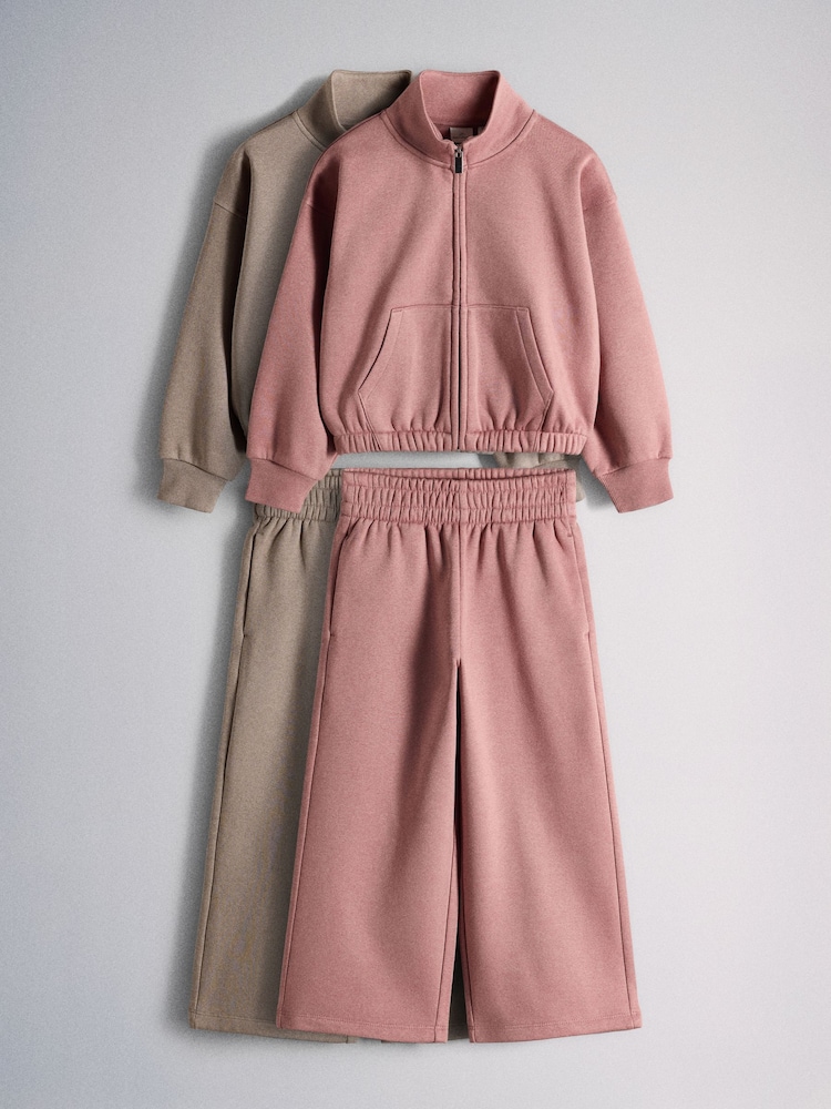 The Set 2 Pack Cropped Funnel Neck Zip Throughs Sweat Top and Wide Leg Joggers Set Pink/Brown - Image 1 of 7 The Set 2 Pack Cropped Funnel Neck Zip Throughs Sweat Top and Wide Leg Joggers Set Pink/Brown - Image 1 of 7