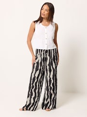 PixieGirl Petite Black Blurred Zebra Print Wide Leg Trousers - Image 1 of 5