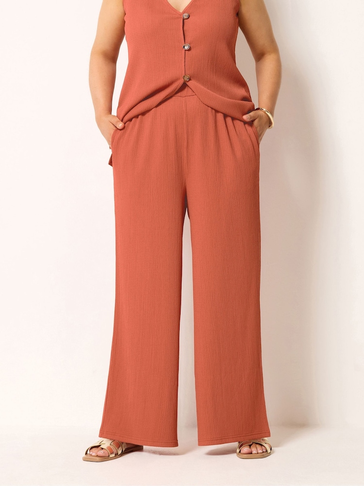 Yours Curve Orange Textured Wide Leg Trousers - Image 1 of 5 Yours Curve Orange Textured Wide Leg Trousers - Image 1 of 5