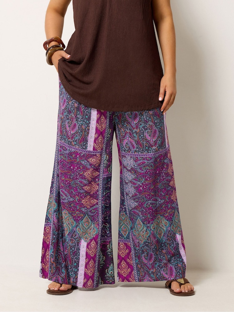 Yours Curve Purple Shirred Waist Wide Leg Trousers - Image 1 of 6 Yours Curve Purple Shirred Waist Wide Leg Trousers - Image 1 of 6