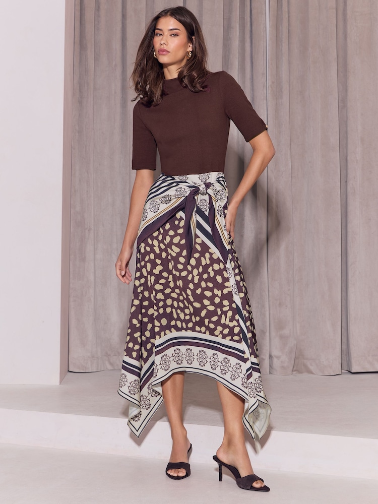 Lipsy Chocolate Brown Mixed Print Foulard Tie Waist Hanky Hem 2 in 1 Short Sleeve Dress - Image 1 of 5 Lipsy Chocolate Brown Mixed Print Foulard Tie Waist Hanky Hem 2 in 1 Short Sleeve Dress - Image 1 of 5