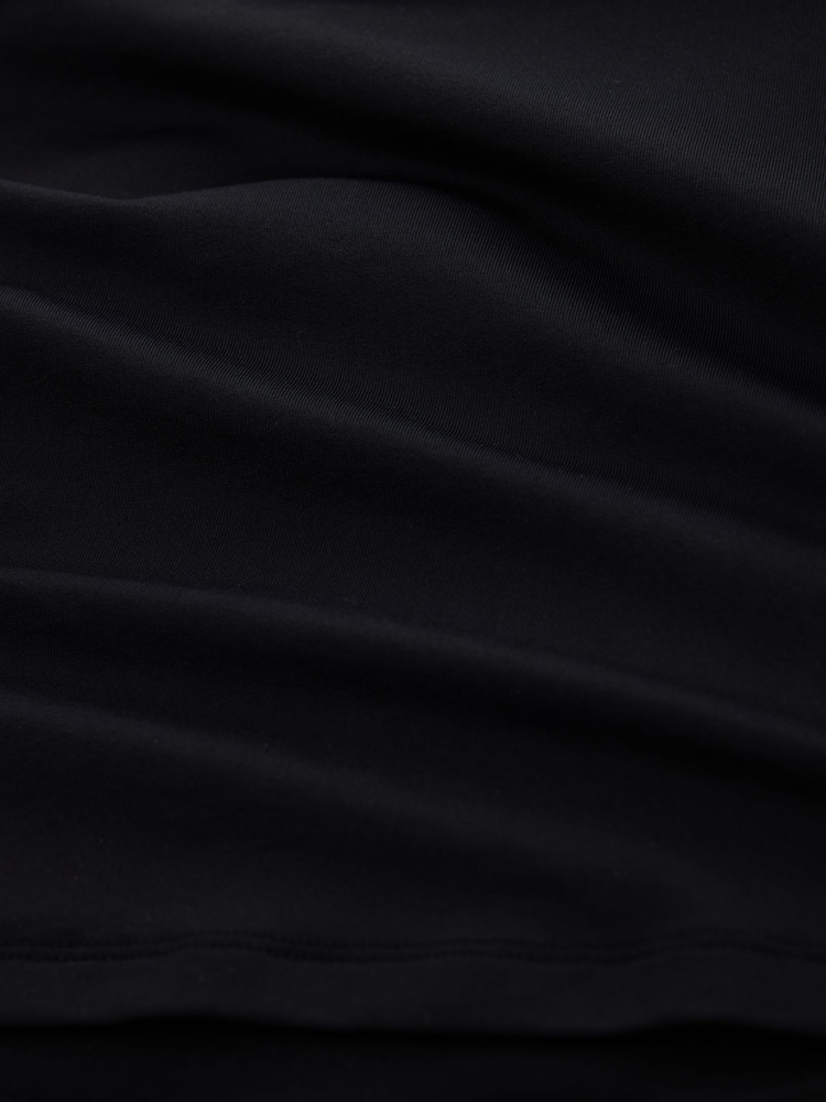 Black Slinky Soft Touch Asymmetric Hardware Short Sleeve Top - Image 7 of 7 Black Slinky Soft Touch Asymmetric Hardware Short Sleeve Top - Image 7 of 7