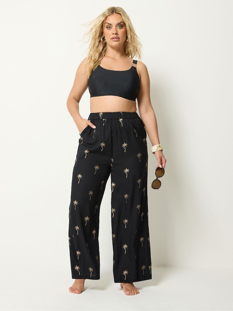 Yours Curve Black Foil Palm Tree Beach Trousers - Image 1 of 5