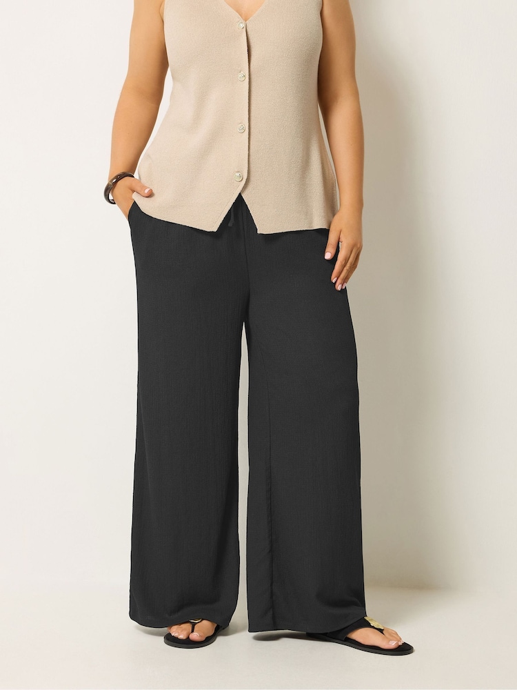 Yours Curve Black Textured Drawstring Trousers - Image 1 of 5 Yours Curve Black Textured Drawstring Trousers - Image 1 of 5