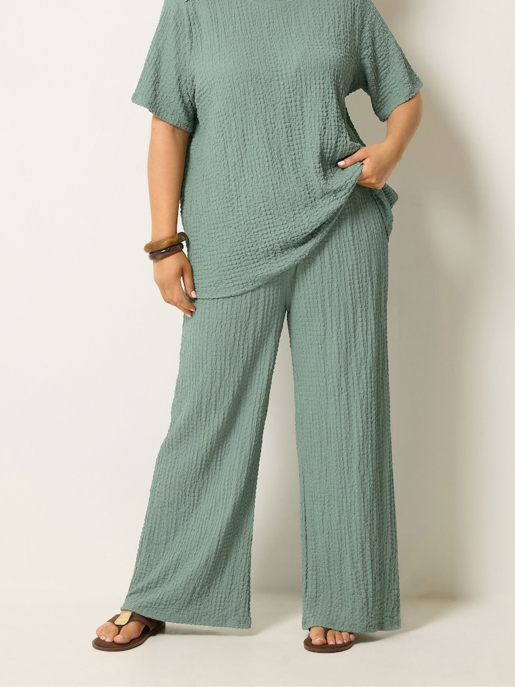 Yours Curve Green Bubble Textured Elastic Trousers - Image 1 of 5 Yours Curve Green Bubble Textured Elastic Trousers - Image 1 of 5