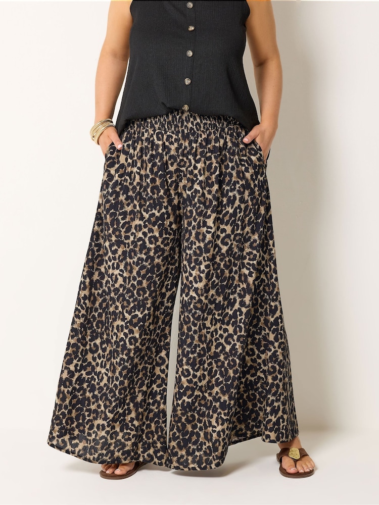 Yours Curve Brown Shirred Waist Wide Leg Trousers - Image 1 of 5 Yours Curve Brown Shirred Waist Wide Leg Trousers - Image 1 of 5