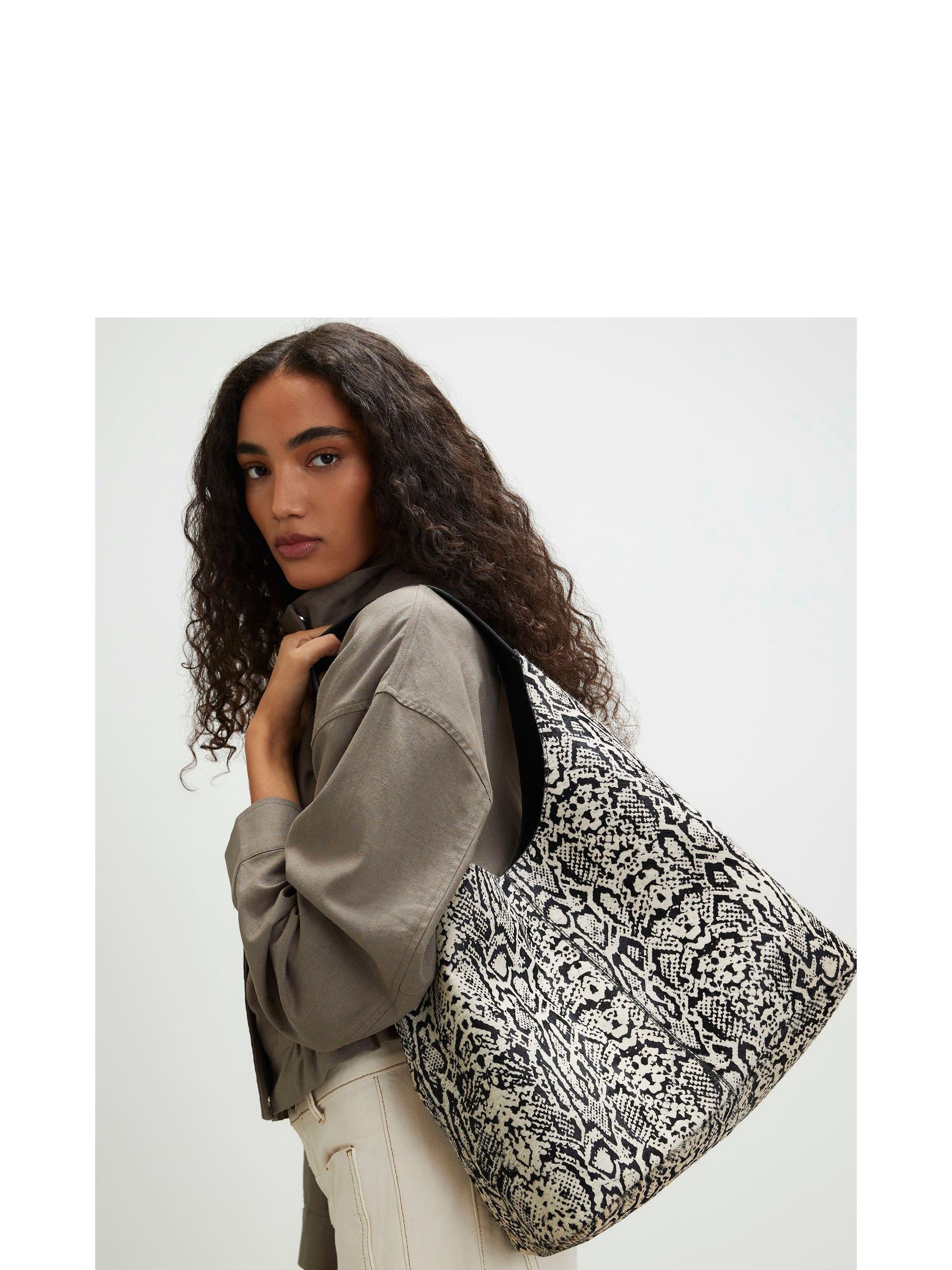 Buy River Island Black/Cream Snake Print Pony Leather Slouch Bag