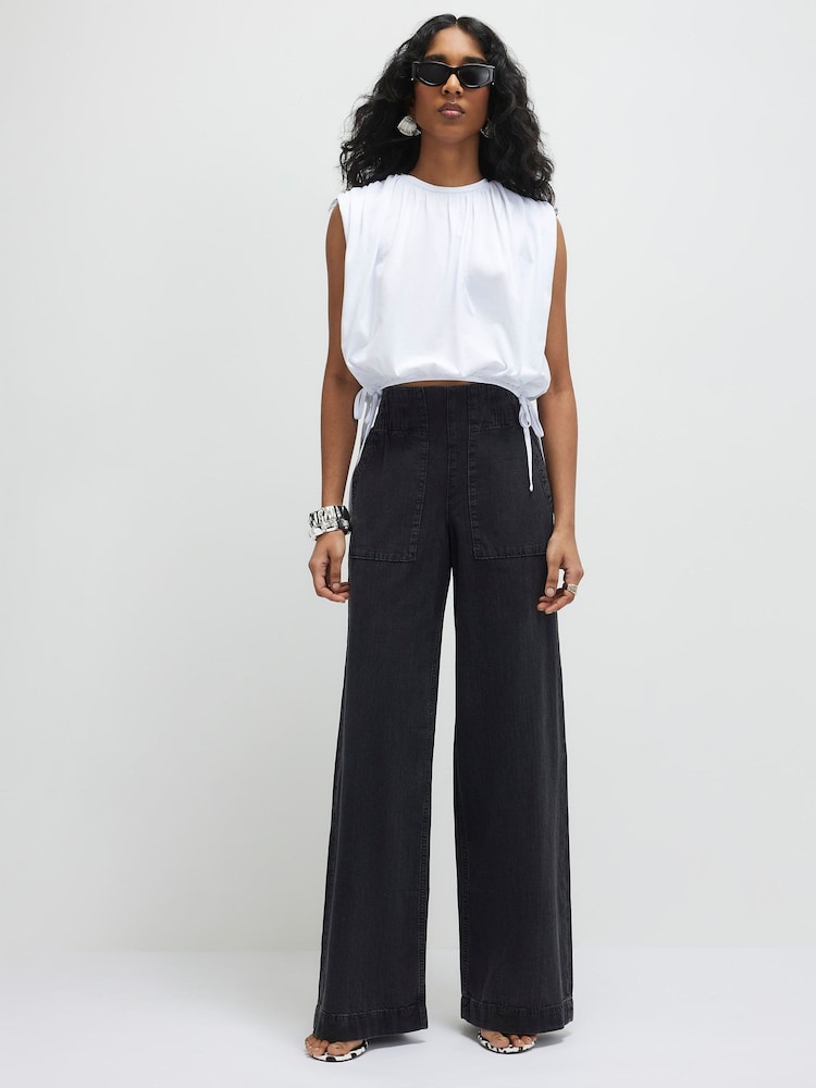 River Island Pull On Elasticated Wide Leg Jeans - Bild 1 von 4 River Island Pull On Elasticated Wide Leg Jeans - Bild 1 von 4