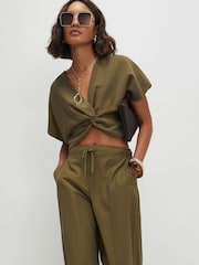 River Island Green Short Sleeve Knot Front Tailored Top - Image 1 of 4