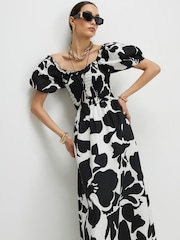 فستان متوسط الطول بأكمام منفوخة وتصميم مجمّع مزيّن بالزهور من River Island - Image 4 of 4