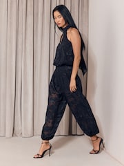 Lipsy Black Halter Neck Burnout Sheer Balloon Pant Jumpsuit - Image 3 of 5