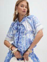River Island Blue Cabbages and Roses Short Sleeve Printed Tie Neck Blouse - Image 1 of 4