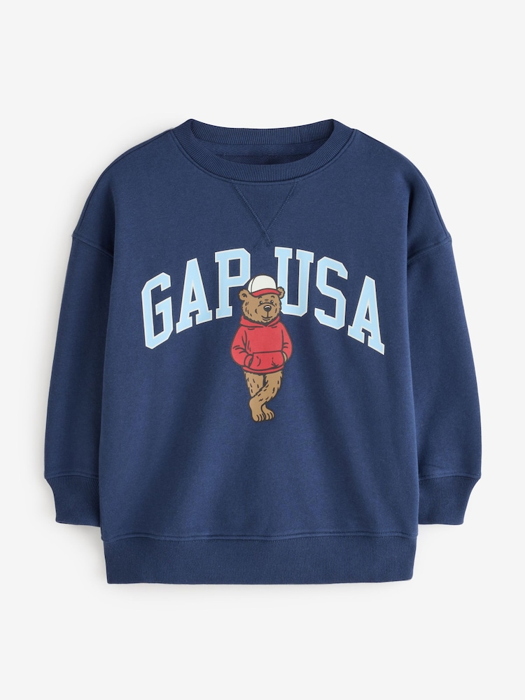 Gap Blue Brannan Bear Americana VintageSoft Terry Oversized Graphic Sweatshirt (4-13yrs) - Image 1 of 5 Gap Blue Brannan Bear Americana VintageSoft Terry Oversized Graphic Sweatshirt (4-13yrs) - Image 1 of 5