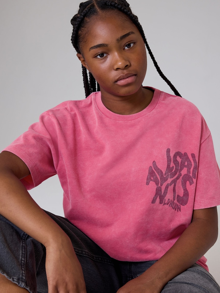 smALLSAINTS Pink Oversized Orlando Logo Crew T-Shirt - Image 1 of 8 smALLSAINTS Pink Oversized Orlando Logo Crew T-Shirt - Image 1 of 8