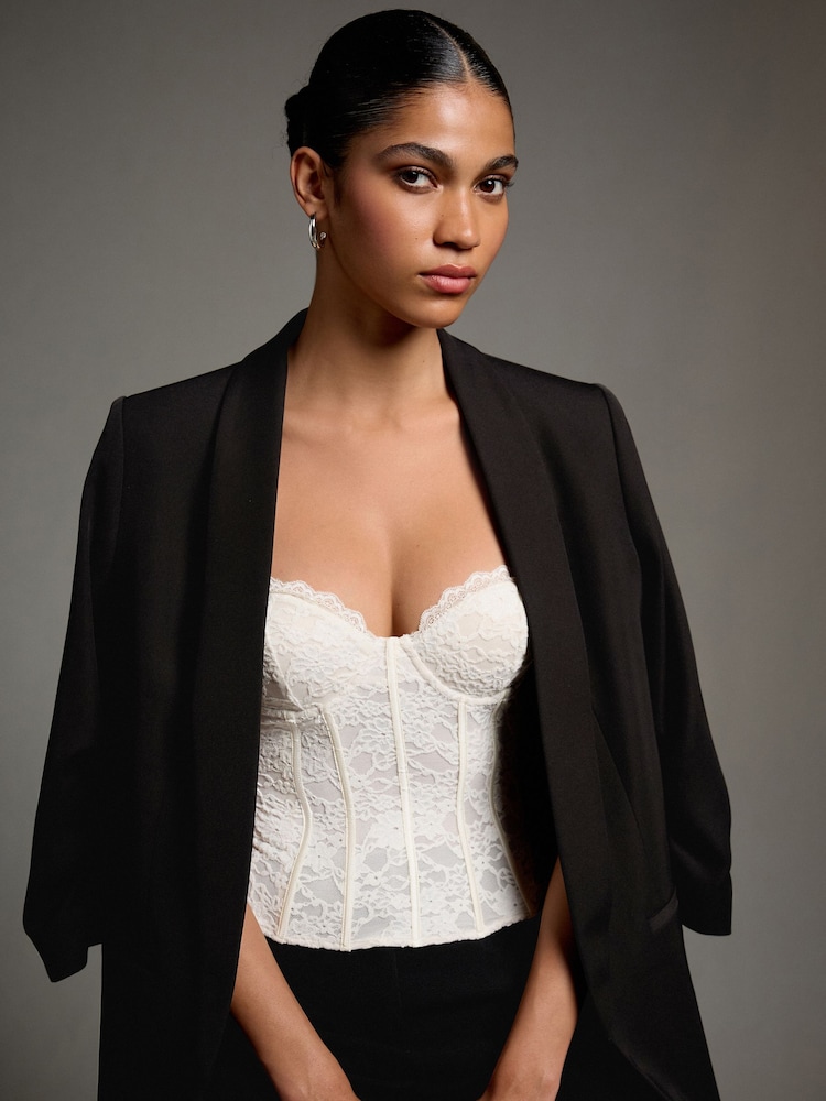 Ecru Sleeveless Floral Lace Corset Top - Image 1 of 9 Ecru Sleeveless Floral Lace Corset Top - Image 1 of 9
