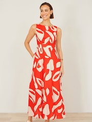 برتقالي - فستان ماكسي مزين بربطة خلفية وطبعات تجريدية مصنوع من القطن من Yumi - Image 3 of 5
