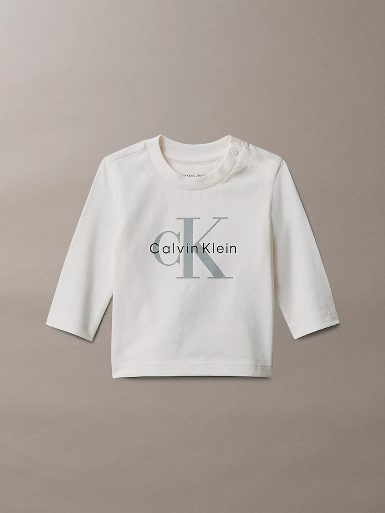 Calvin Klein Jeans Cream/Tofu Newborn Long Sleeve Logo T-Shirt - Image 1 of 2 Calvin Klein Jeans Cream/Tofu Newborn Long Sleeve Logo T-Shirt - Image 1 of 2