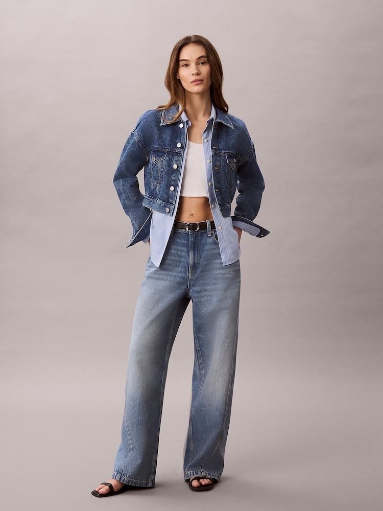 Calvin Klein Blue Low Rise Twisted Baggy Jeans - Image 1 of 7 Calvin Klein Blue Low Rise Twisted Baggy Jeans - Image 1 of 7