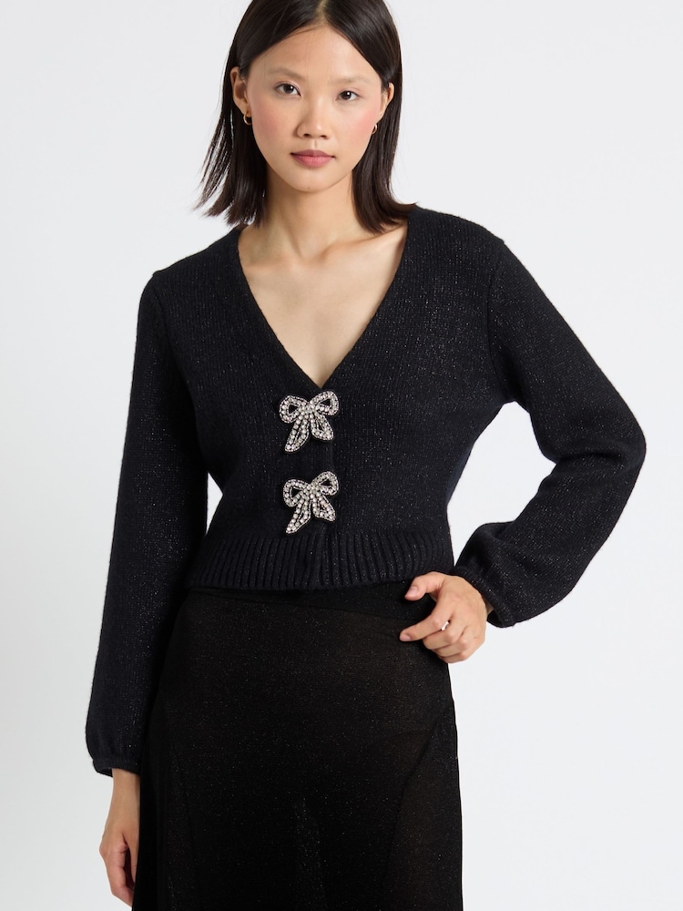 Chinti & Parker Laura Whitmore Embellished Bow Black Cardigan - Image 1 of 4 Chinti & Parker Laura Whitmore Embellished Bow Black Cardigan - Image 1 of 4