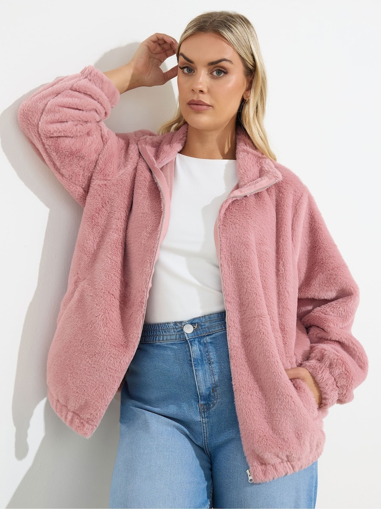Yours Curve Pink Faux Fur Funnel Neck Zip Thru Jacket - Image 1 of 5 Yours Curve Pink Faux Fur Funnel Neck Zip Thru Jacket - Image 1 of 5
