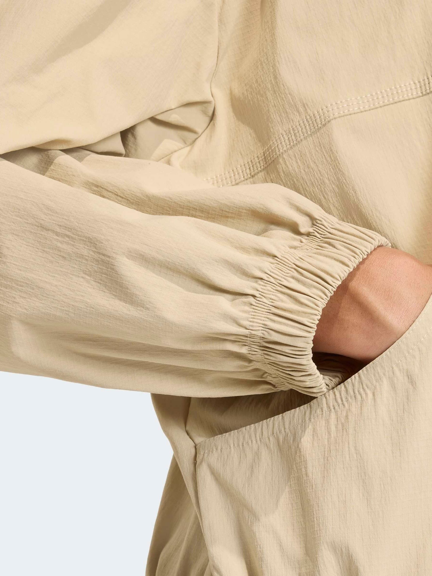 Buy adidas Originals Beige Essentials Woven Windbreaker from Next USA
