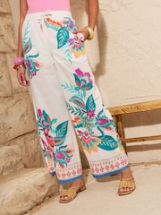 Love & Roses Ivory Tropical Parrot Embroidered Print Petite Beach Wide Leg Trousers - Image 1 of 4