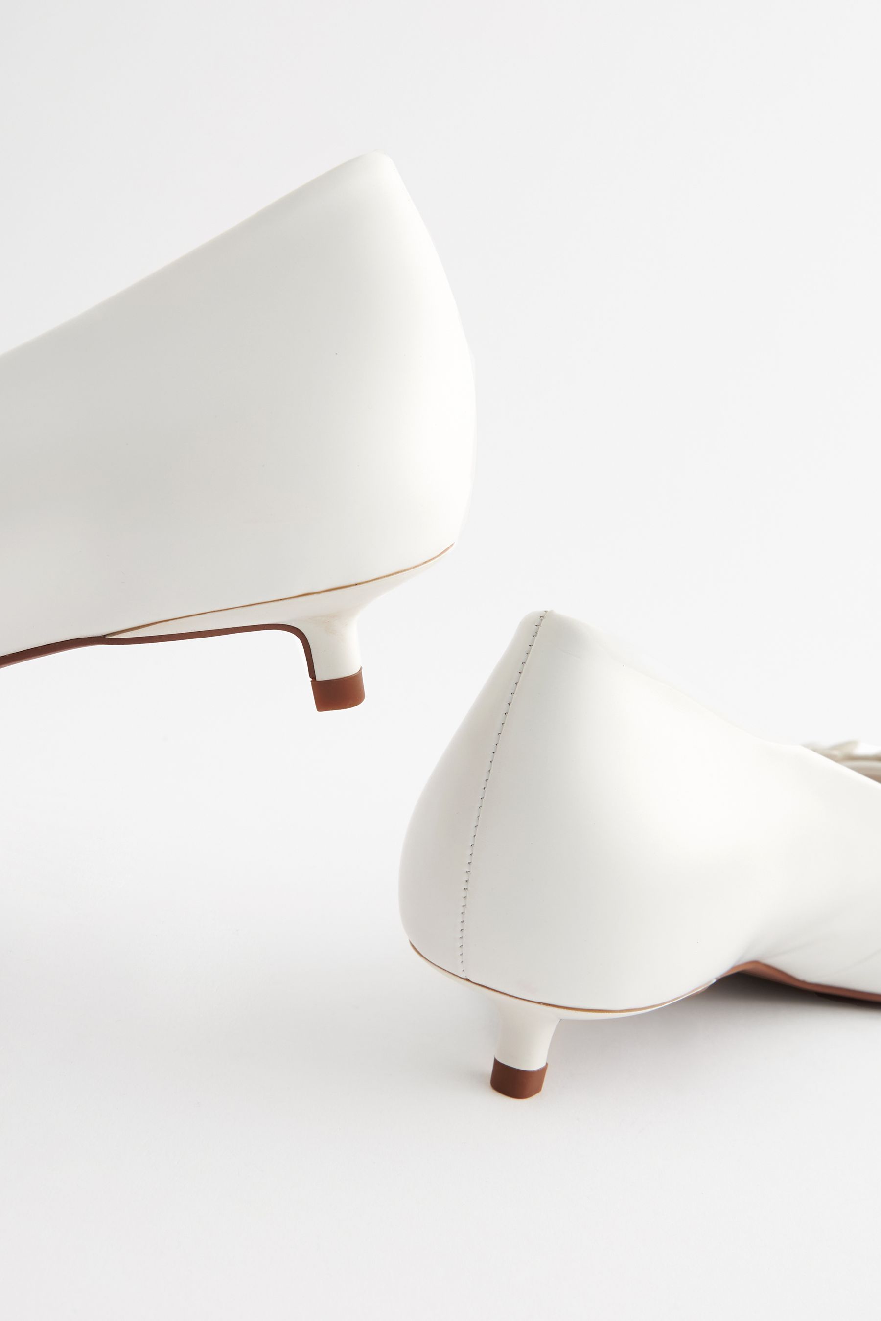 White court shoes low heel sale