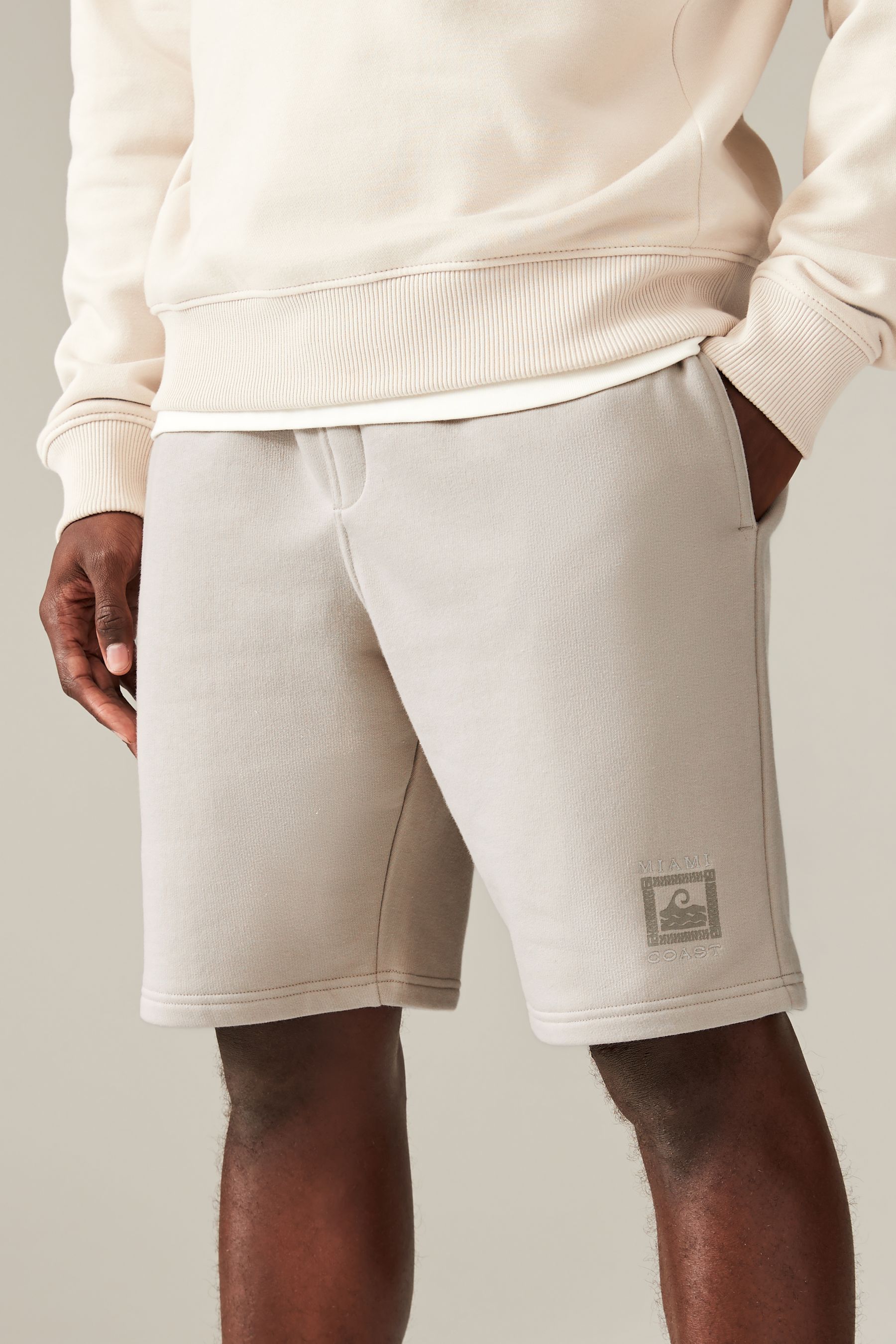 Knee length jersey shorts deals