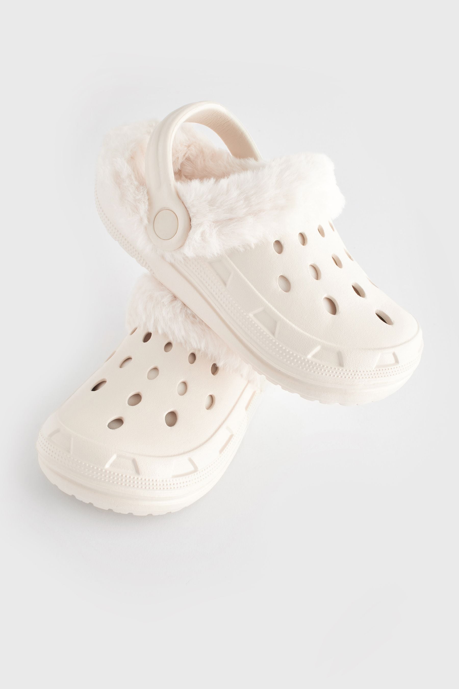 Buy Neutral Bone Faux Fur Lined Clog Slippers from the Next UK
