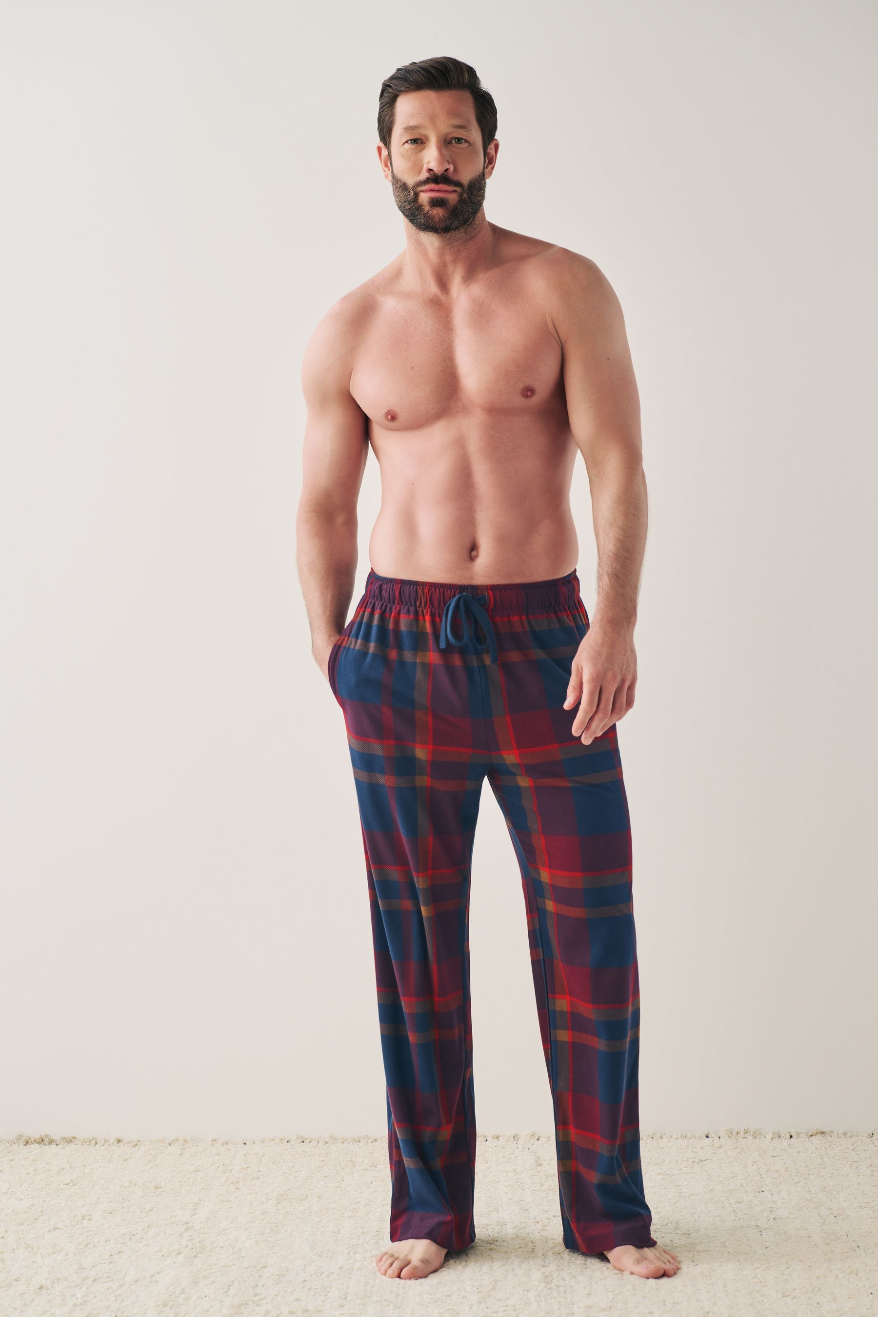 Buy Navy Blue Red Check Motionflex Cosy Pyjama Bottoms from the Next UK online shop