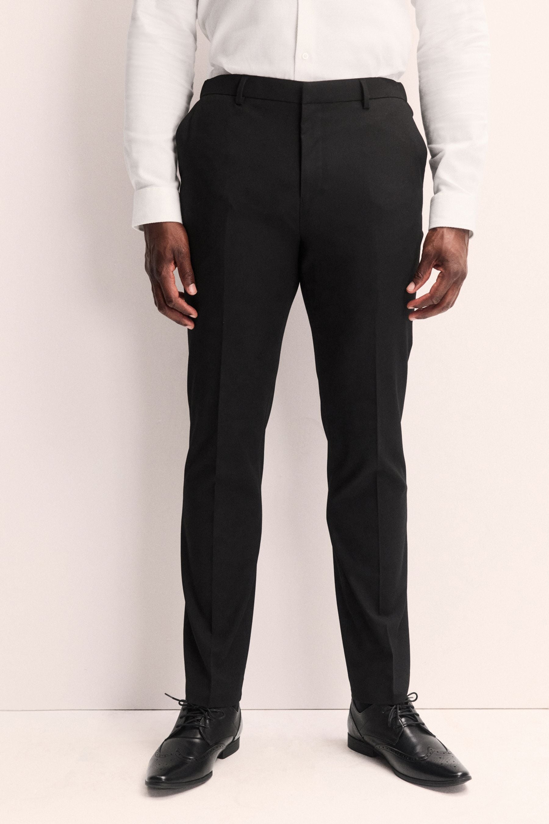 Buy Black Muscle Fit Muscle FIt Motionflex Stretch Suit Trousers from Next United Arab Emirates