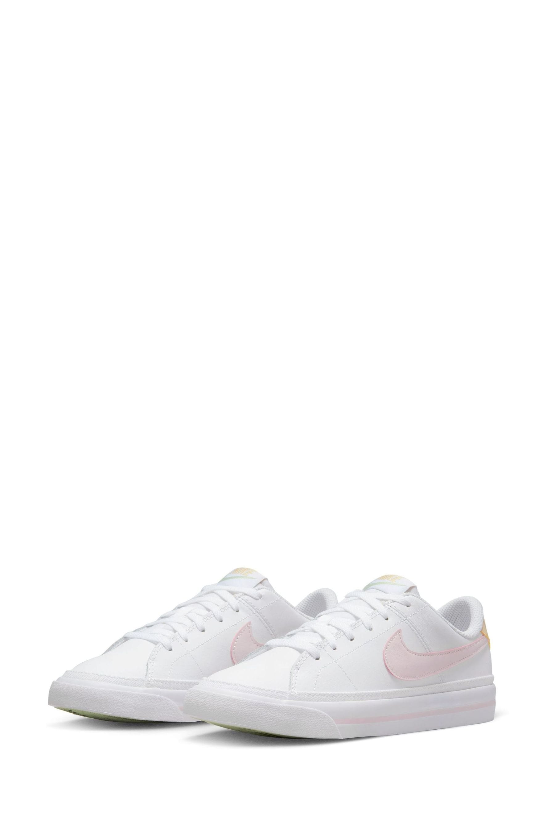 Nike blush pink trainers sales