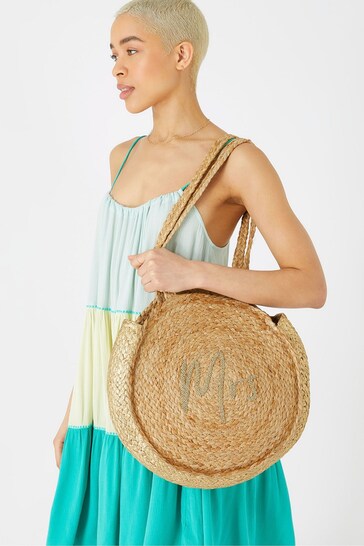 Accessorize cross body bag in natural straw