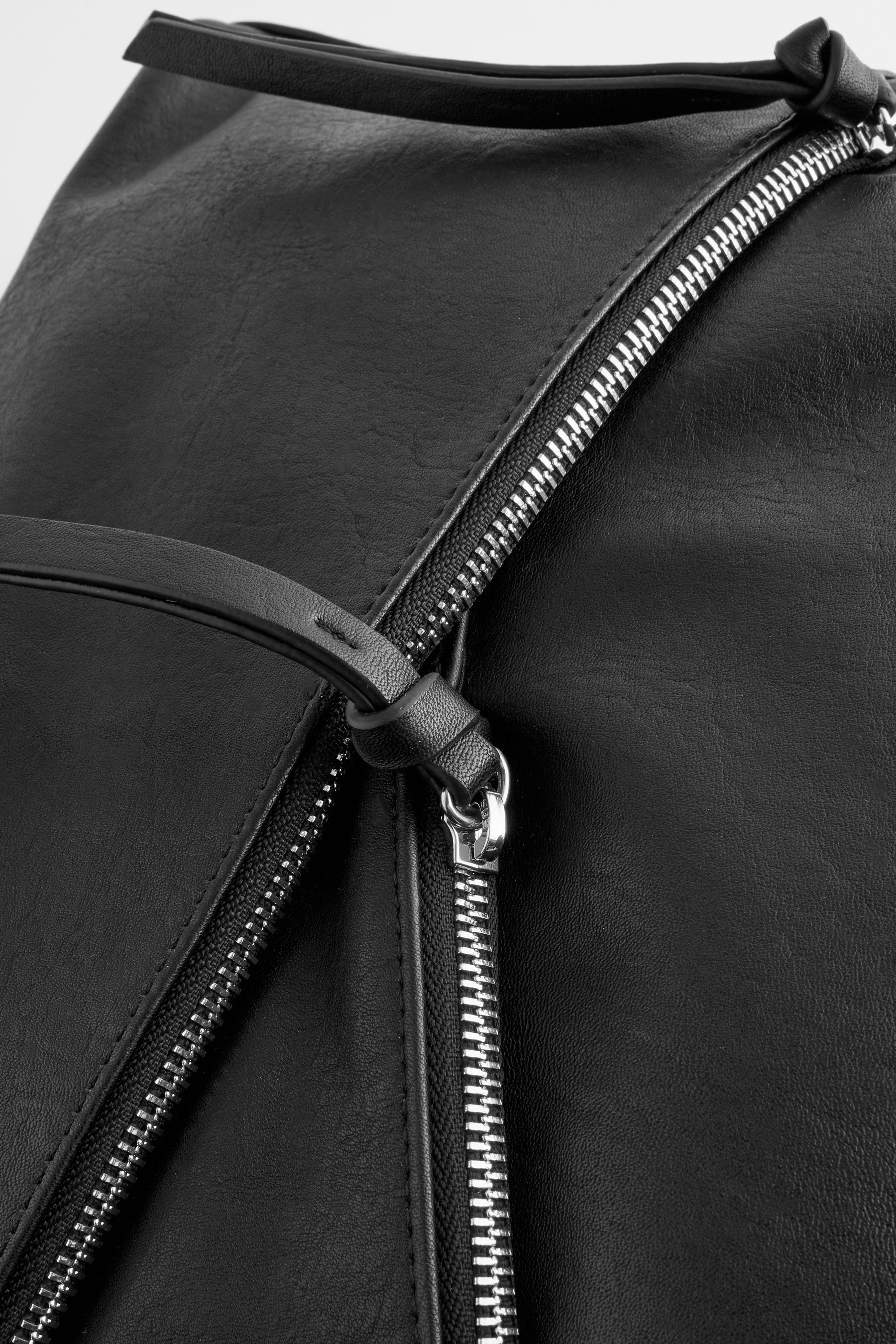 Buy Black Side Zip Backpack from the Next UK online shop