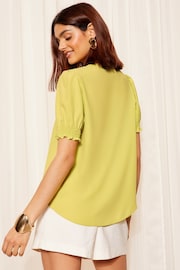 Friends Like These Green Ruffle Front Puff Sleeve Blouse - Image 4 of 4