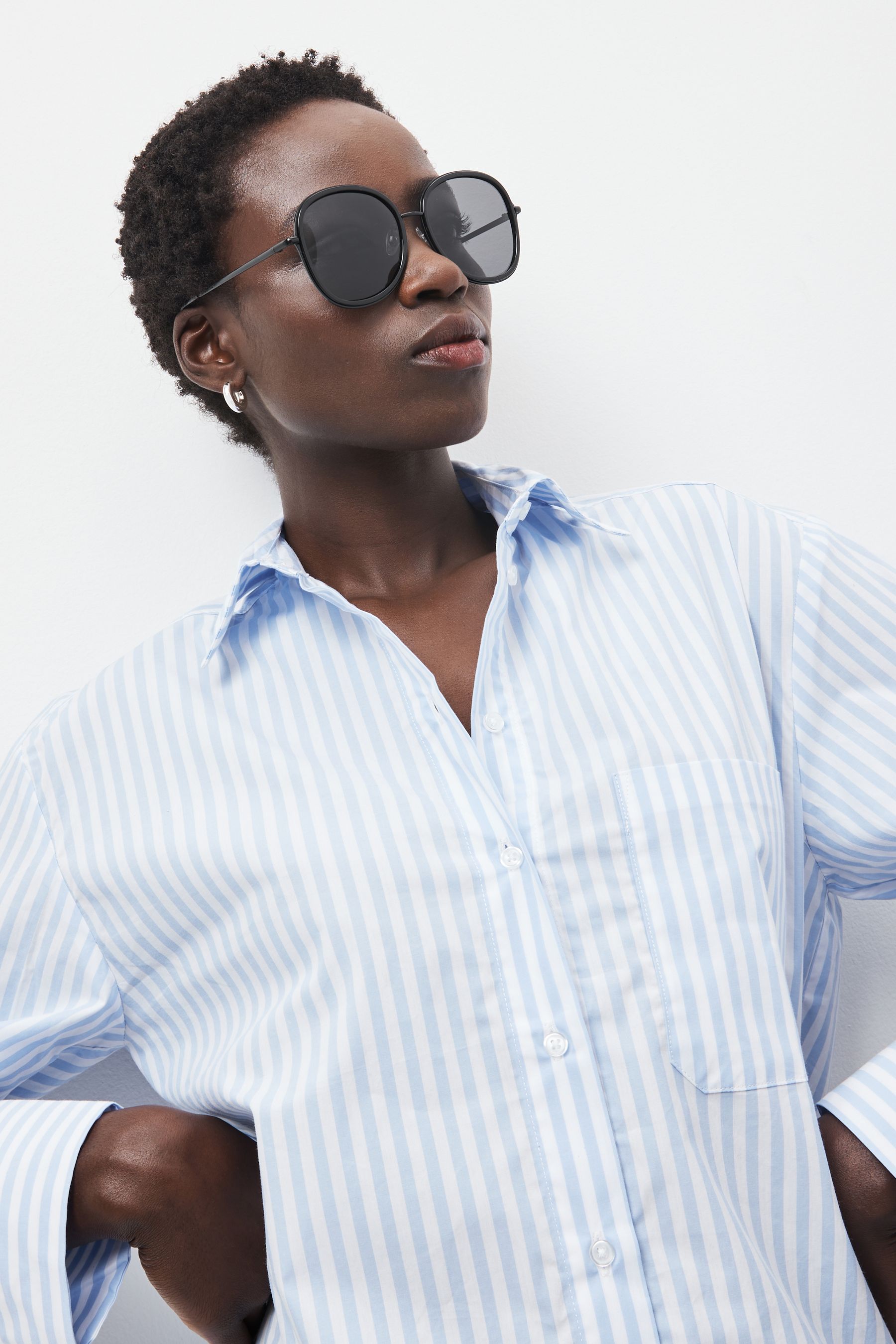 Buy Black Polarised Large Round Sunglasses from Next Luxembourg