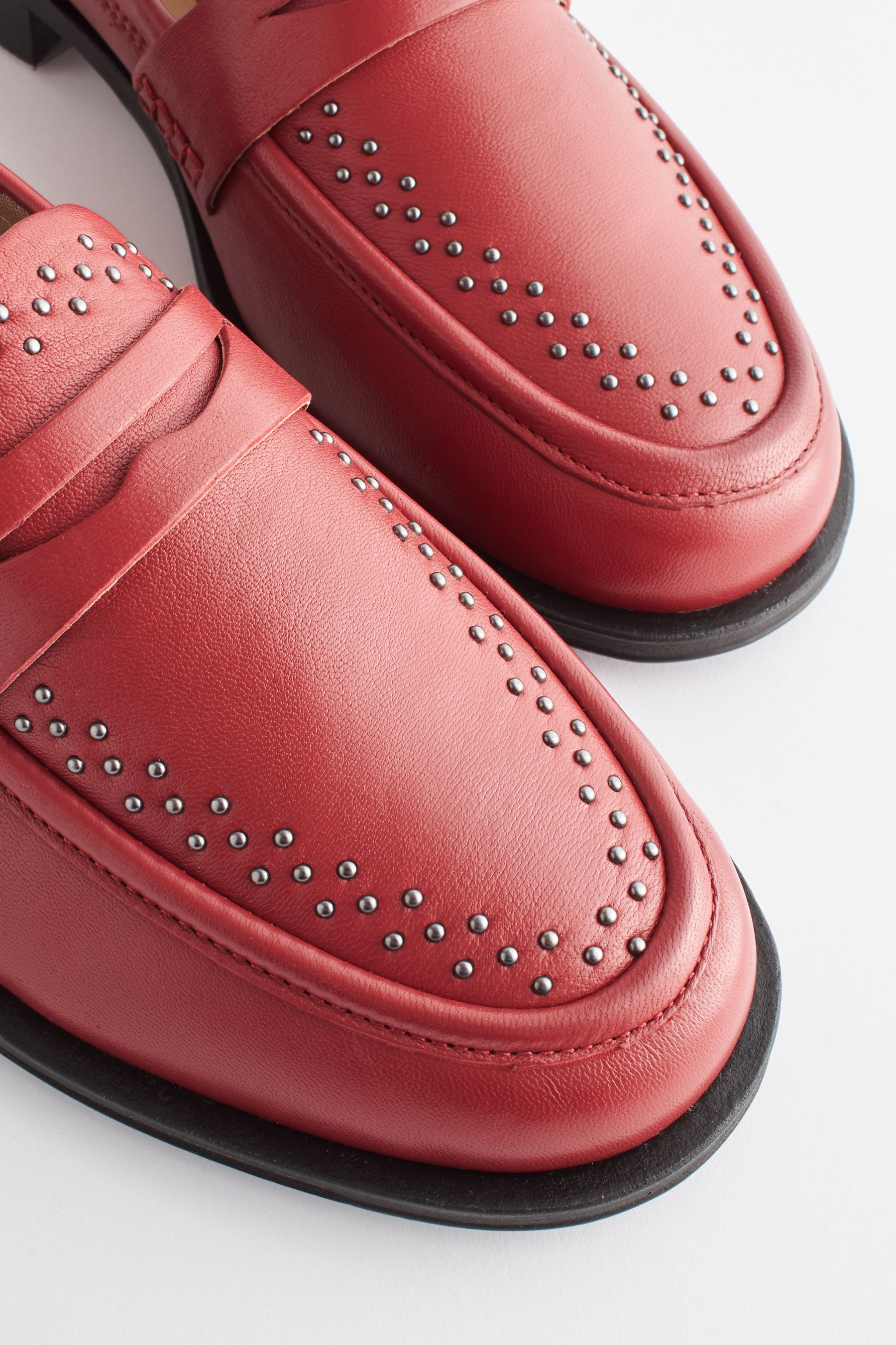 Red studded loafers top