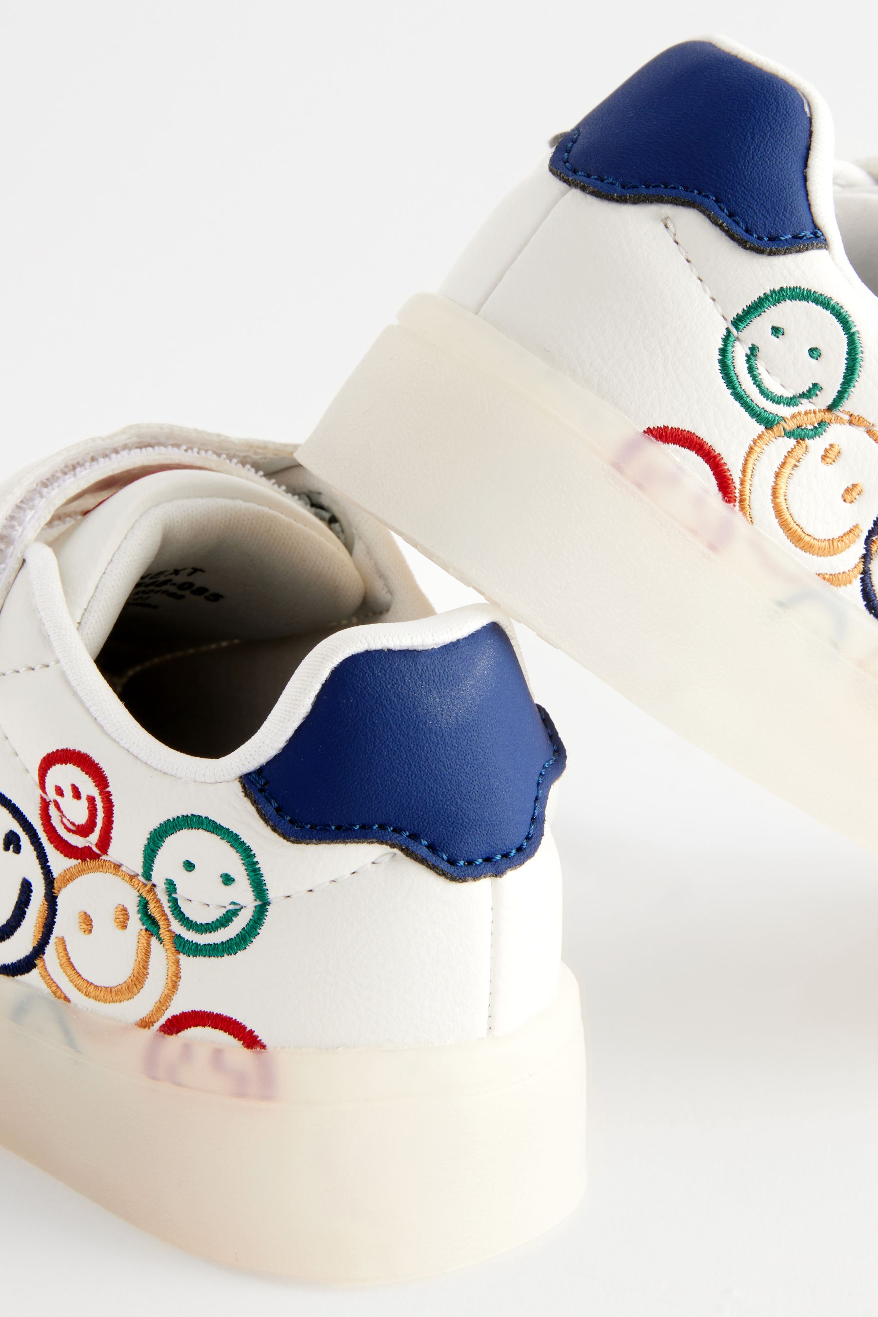 Next flashing trainers hot sale