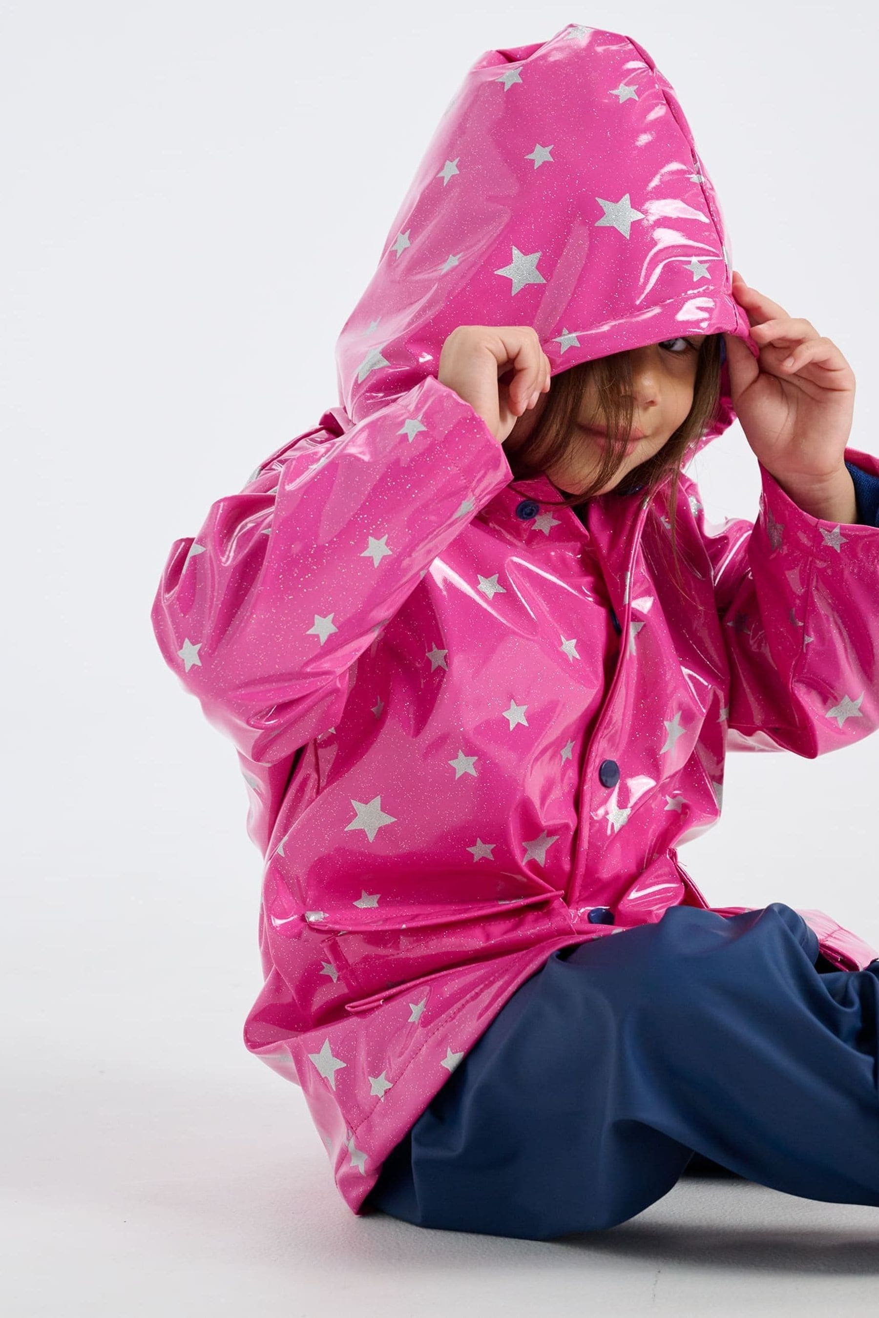 Buy Hatley Pink Glitter Stars Raincoat from Next Luxembourg