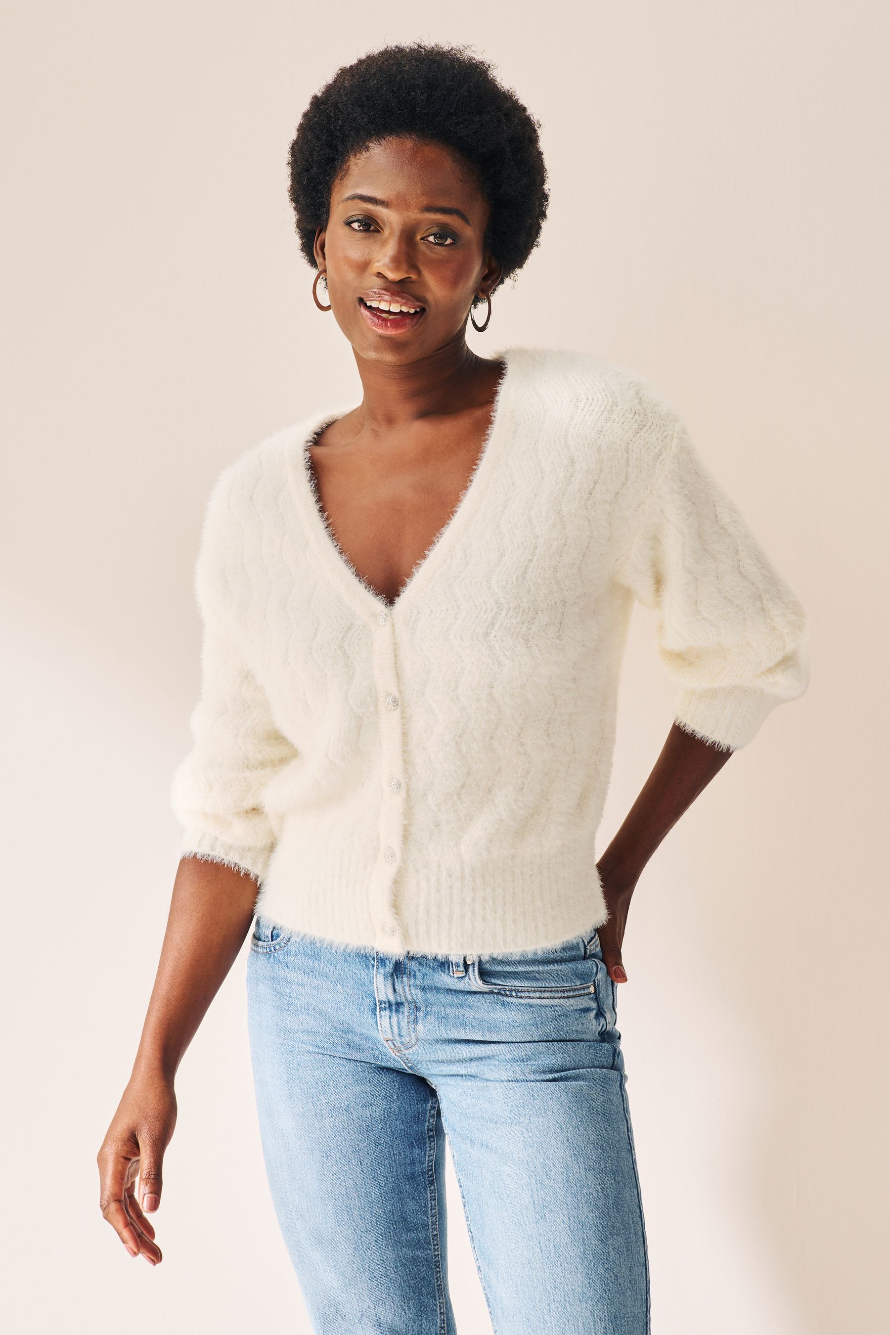 Beige fluffy cardigan deals