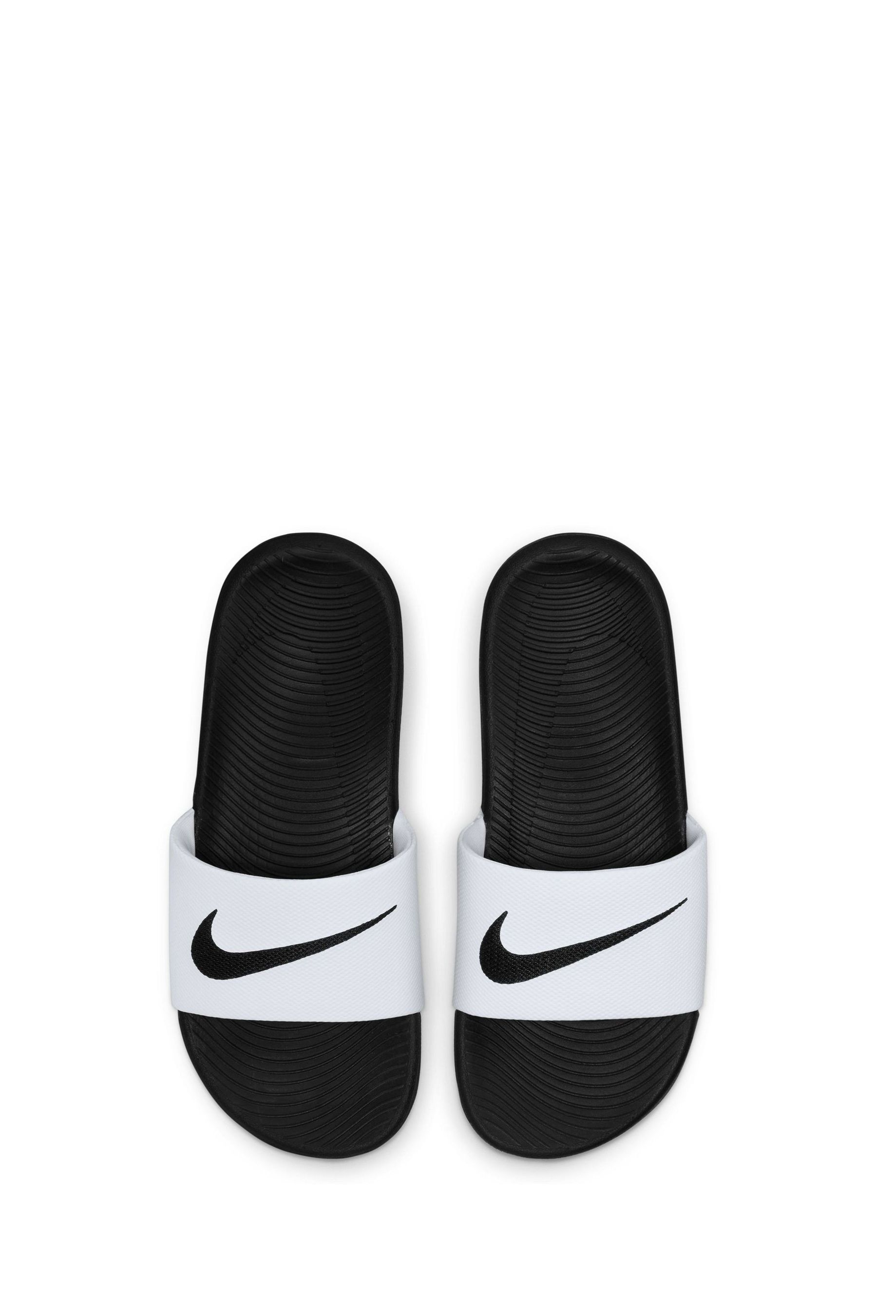 Nike sliders junior online