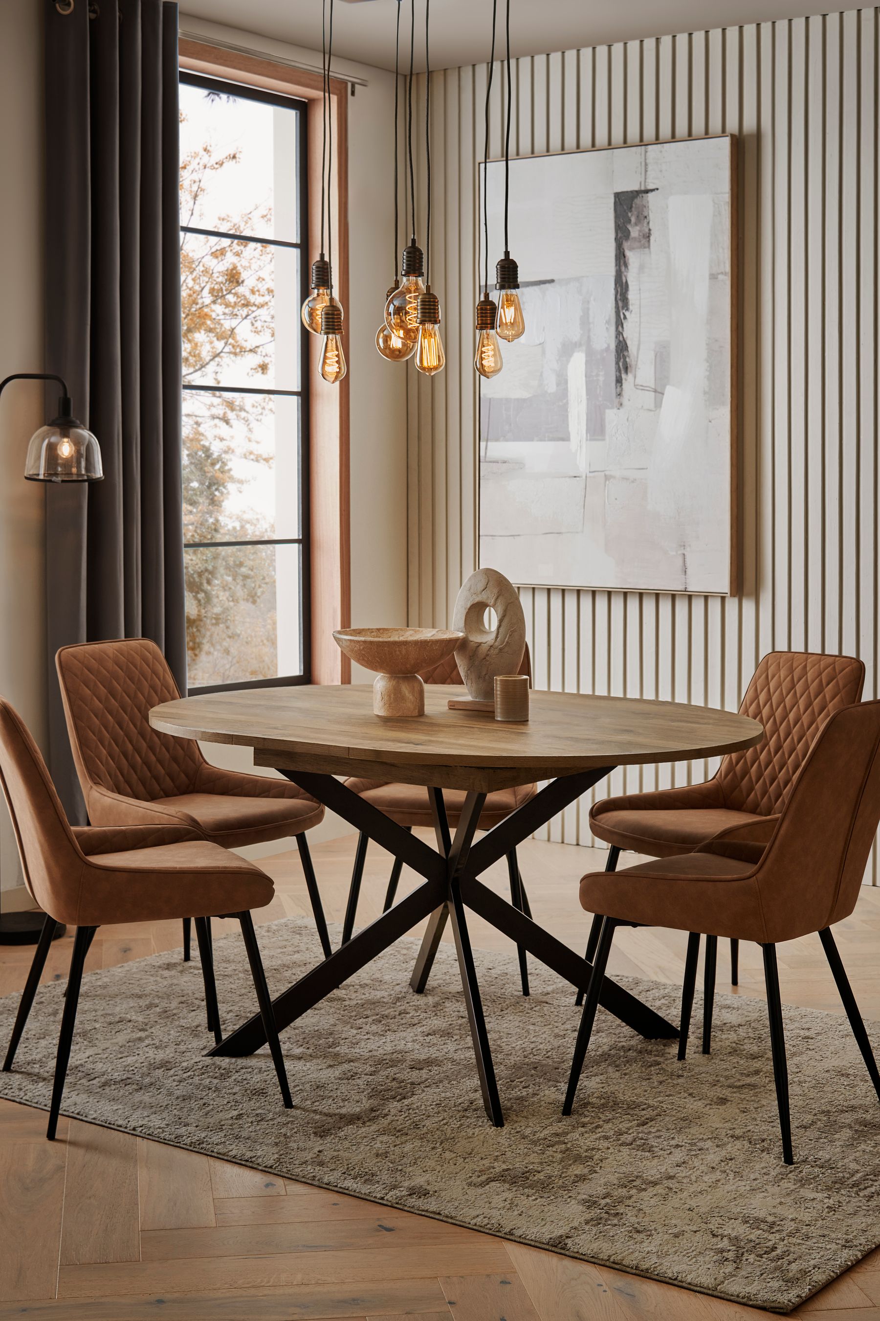 Buy Dark Bronx Oak Effect Round 4 to 6 Seater Extending Dining Table from the Next UK online shop