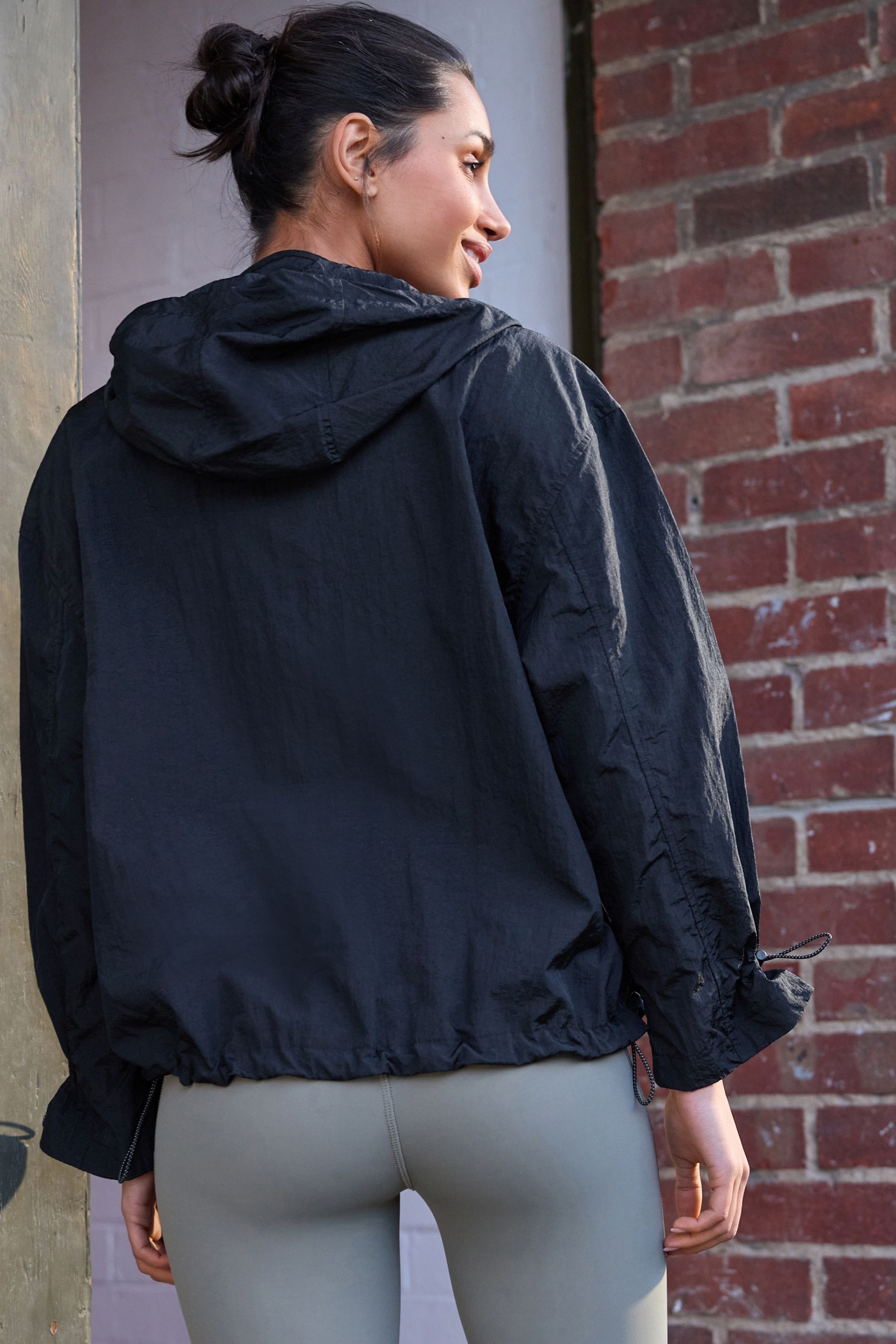 Buy Black Packable Rain Hooded Shower Resistant Jacket from the Next UK online shop