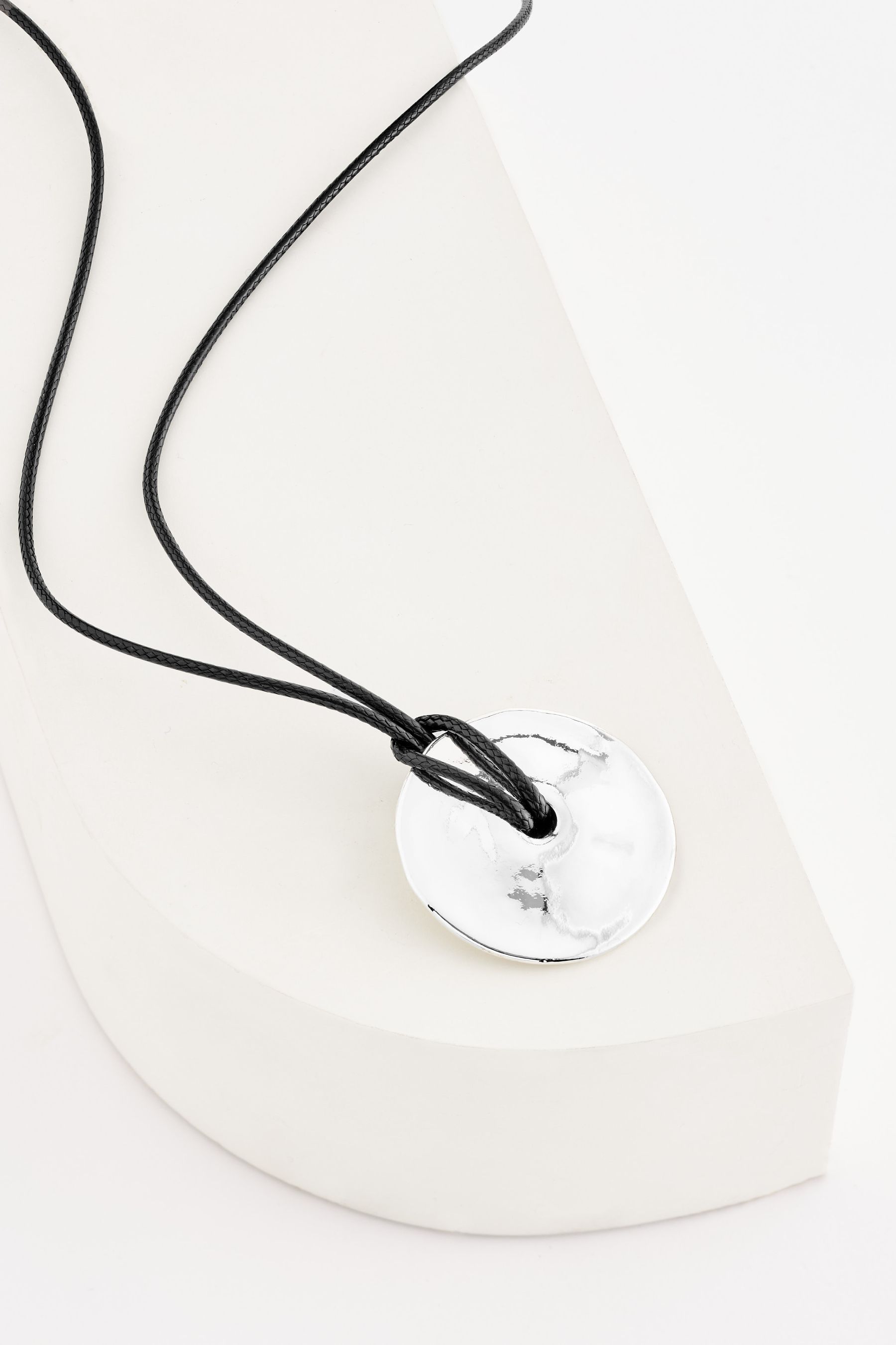 Black cord necklace hotsell with silver pendant