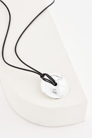 Black Cord Long Necklace with Silver Tone Pendant - Image 1 of 2