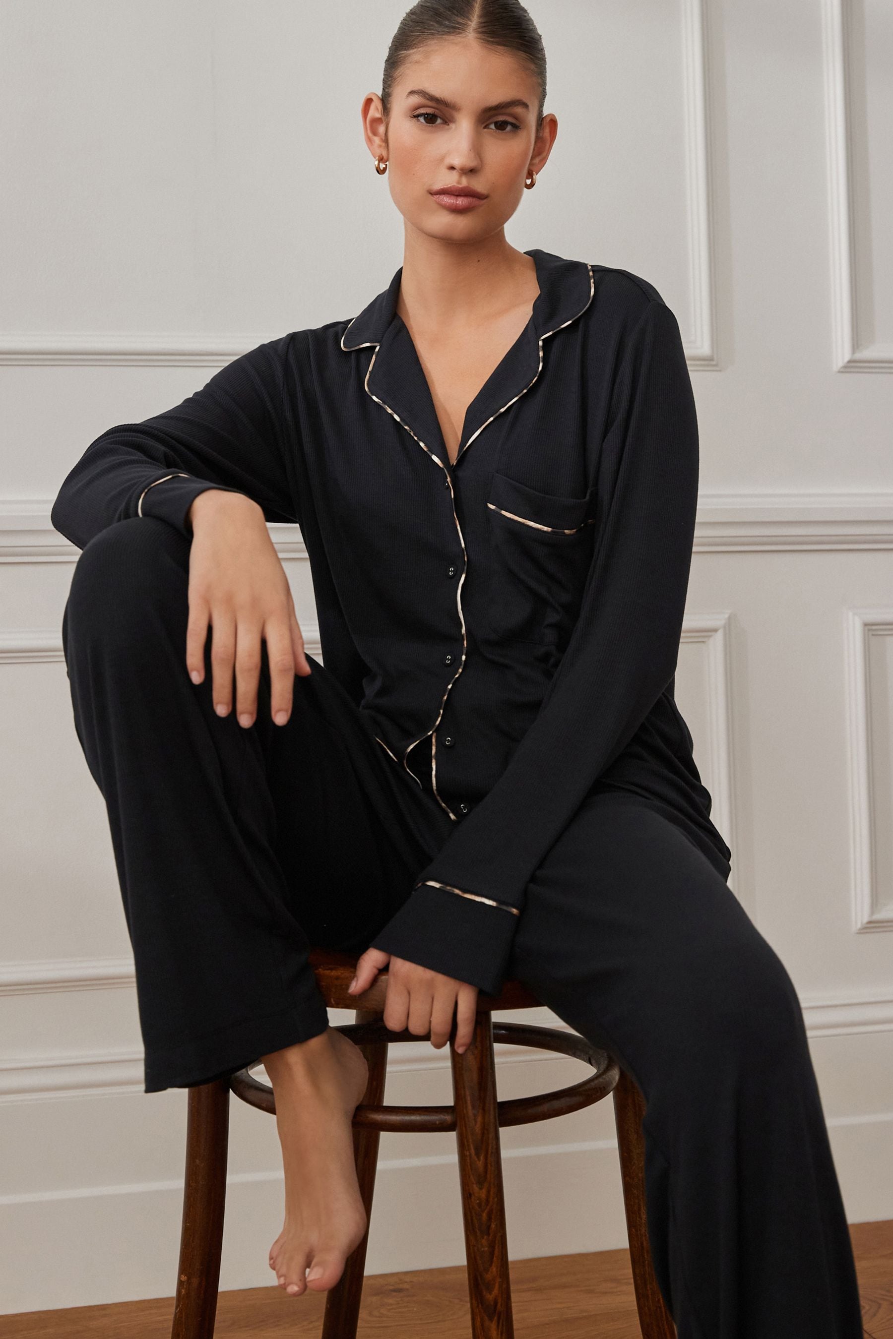 Buy Black Ribbed Button Through Pyjamas from the Next UK online shop