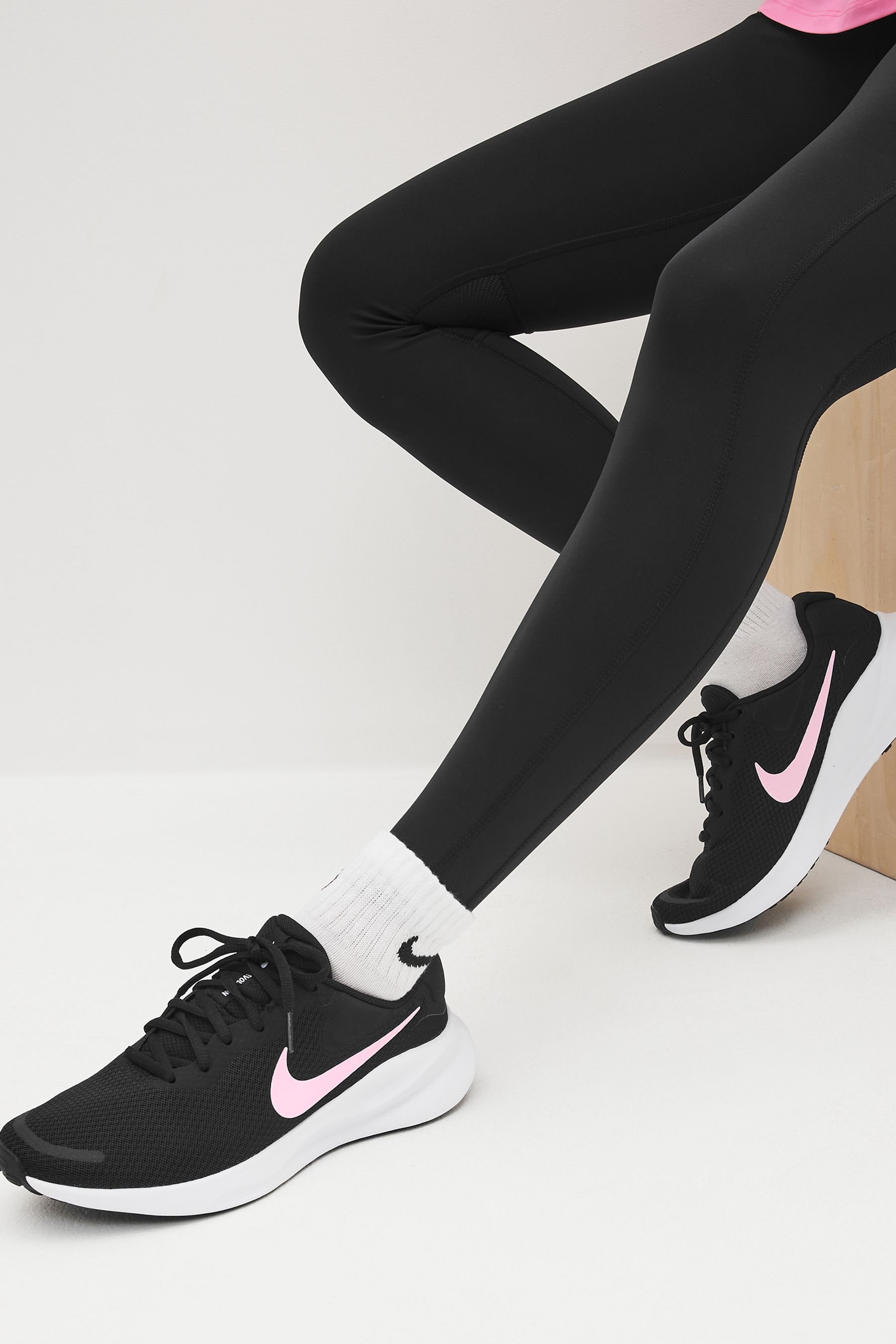 Nike black and pink revolution trainers cheap